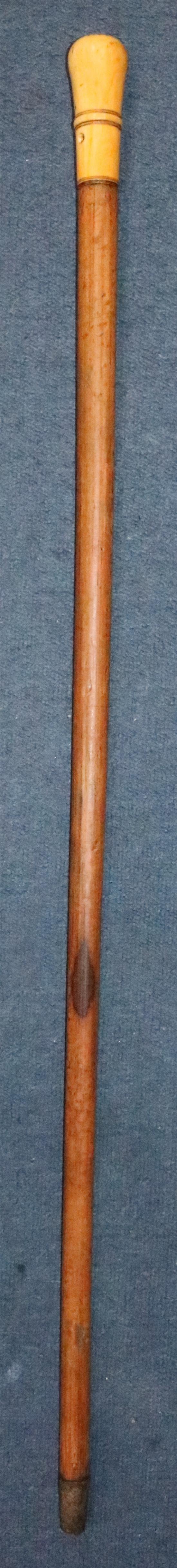 An English ivory and pique work handled walking cane, late 17th century, 98.5cm (38.75in.)